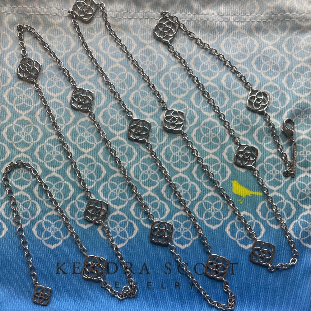 EUC Silver Devalyn Logo Necklace